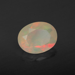 1.29캐럿 천연 멀티컬러 오팔, 타원형 컷, 9.2×7.2 mm, 투명한