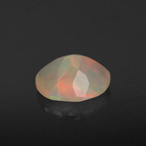 1.29캐럿 천연 멀티컬러 오팔, 타원형 컷, 9.2×7.2 mm, 투명한