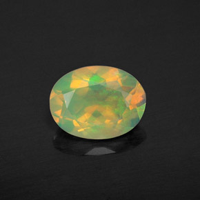 0.94캐럿 천연 멀티컬러 오팔, 타원형 컷, 8.4×6.4 mm, 투명한