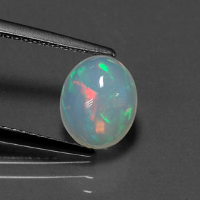 1.29캐럿 천연 멀티컬러 오팔, 타원형 컷, 8.8×7.2 mm, 투명한