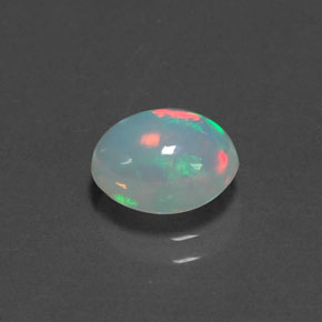 1.29캐럿 천연 멀티컬러 오팔, 타원형 컷, 8.8×7.2 mm, 투명한