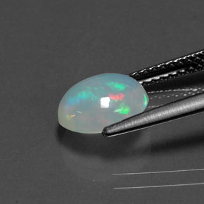 1.29캐럿 천연 멀티컬러 오팔, 타원형 컷, 8.8×7.2 mm, 투명한