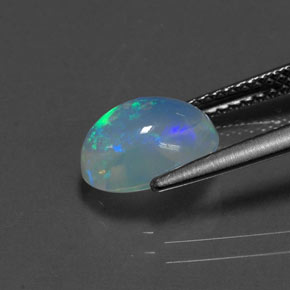 1.44캐럿 천연 멀티컬러 오팔, 타원형 컷, 9.3×6.9 mm, 투명한