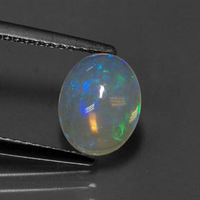 1.11캐럿 천연 멀티컬러 오팔, 타원형 컷, 8.9×7.1 mm, 투명한