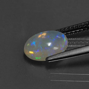 1.11캐럿 천연 멀티컬러 오팔, 타원형 컷, 8.9×7.1 mm, 투명한