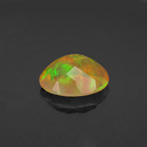 1.56캐럿 천연 멀티컬러 오팔, 타원형 컷, 10.1×8.1 mm, 투명한