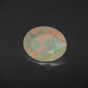 1.46캐럿 천연 멀티컬러 오팔, 타원형 컷, 10.9×8.7 mm, 투명한