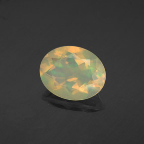1.64캐럿 천연 멀티컬러 오팔, 타원형 컷, 10.1×8 mm, 투명한