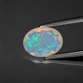 1.22캐럿 천연 멀티컬러 오팔, 타원형 컷, 10.7×8 mm, 투명한