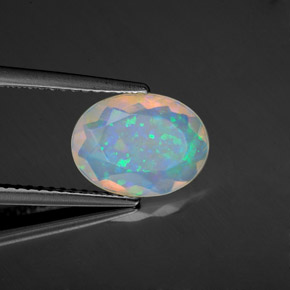 1.22캐럿 천연 멀티컬러 오팔, 타원형 컷, 10.7×8 mm, 투명한