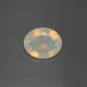 1.60캐럿 천연 멀티컬러 오팔, 타원형 컷, 10.5×8.7 mm, 투명한