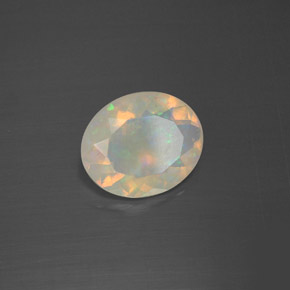1.60캐럿 천연 멀티컬러 오팔, 타원형 컷, 10.5×8.7 mm, 투명한
