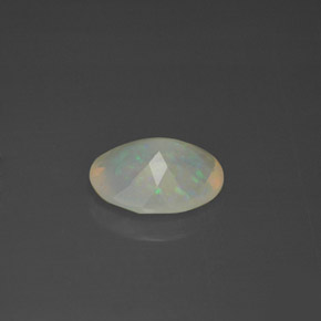 1.60캐럿 천연 멀티컬러 오팔, 타원형 컷, 10.5×8.7 mm, 투명한