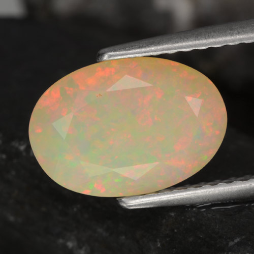1.51캐럿 천연 멀티컬러 오팔, 타원형 컷, 10.9×7.6 mm, 투명한
