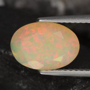 1.51캐럿 천연 멀티컬러 오팔, 타원형 컷, 10.9×7.6 mm, 투명한