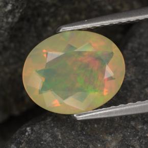 1.24캐럿 천연 멀티컬러 오팔, 타원형 컷, 10×8 mm, 투명한