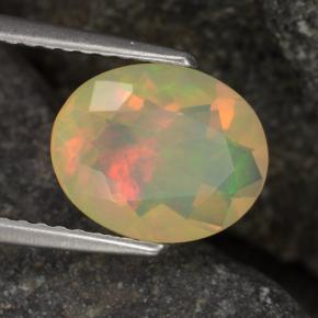 1.24캐럿 천연 멀티컬러 오팔, 타원형 컷, 10×8 mm, 투명한