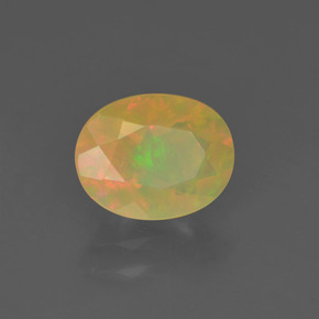 0.85캐럿 천연 멀티컬러 오팔, 타원형 컷, 8.2×6.4 mm, 투명한
