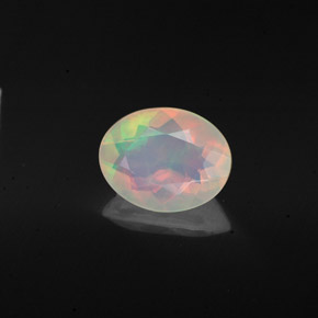 0.98캐럿 천연 멀티컬러 오팔, 타원형 컷, 9×7.1 mm, 투명한
