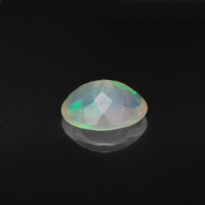 0.98캐럿 천연 멀티컬러 오팔, 타원형 컷, 9×7.1 mm, 투명한