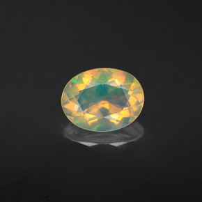 1.13캐럿 천연 멀티컬러 오팔, 타원형 컷, 9×7 mm, 투명한