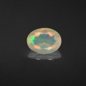 1.10캐럿 천연 멀티컬러 오팔, 타원형 컷, 8.8×6.7 mm, 투명한