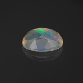 1.06캐럿 천연 멀티컬러 오팔, 타원형 컷, 8.9×6.7 mm, 투명한