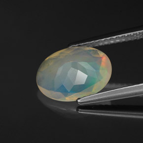 1.53캐럿 천연 멀티컬러 오팔, 타원형 컷, 10.9×8.2 mm, 투명한