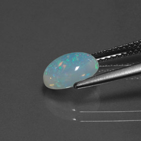1.14캐럿 천연 멀티컬러 오팔, 타원형 컷, 8.6×6.8 mm, 투명한