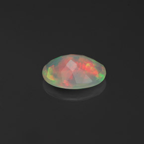 0.63캐럿 천연 멀티컬러 오팔, 투명한, 8.3×6.2 mm, 투명/반투명