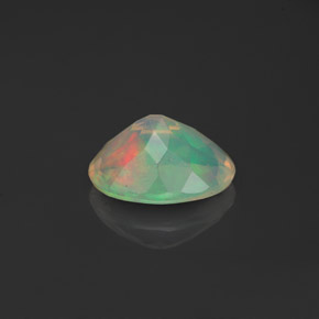 0.78캐럿 천연 멀티컬러 오팔, 투명한, 8.2×6.2 mm, 투명/반투명
