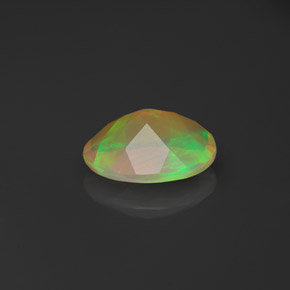0.76캐럿 천연 멀티컬러 오팔, 투명한, 8.2×6.1 mm, 투명/반투명