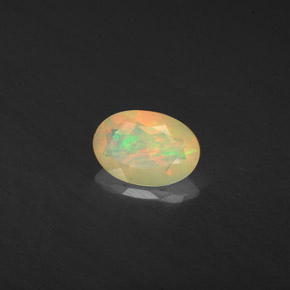 0.41캐럿 천연 멀티컬러 오팔, 투명한, 7×4.8 mm, 투명/반투명