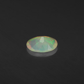 0.37캐럿 천연 멀티컬러 오팔, 투명한, 7×5.1 mm, 투명/반투명