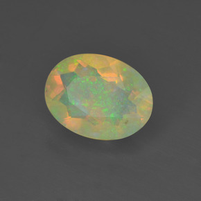 0.88캐럿 천연 멀티컬러 오팔, 타원형 컷, 8.9×6.7 mm, 투명한