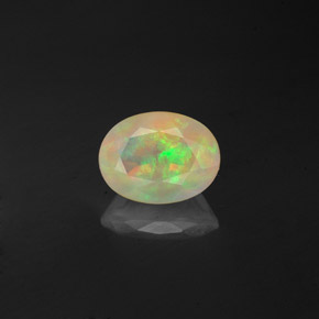 0.85캐럿 천연 멀티컬러 오팔, 투명한, 8×6.1 mm, 투명/반투명