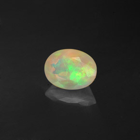 0.85캐럿 천연 멀티컬러 오팔, 투명한, 8×6.1 mm, 투명/반투명