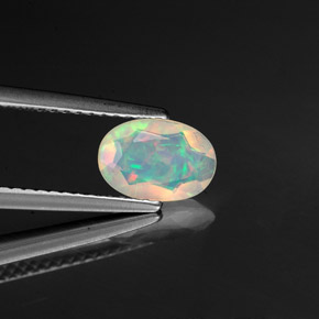 0.57캐럿 천연 멀티컬러 오팔, 투명한, 8.2×5.7 mm, 투명/반투명