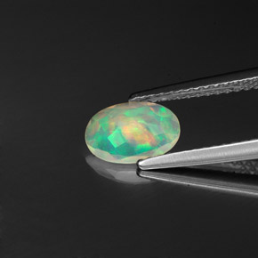 0.57캐럿 천연 멀티컬러 오팔, 투명한, 8.2×5.7 mm, 투명/반투명