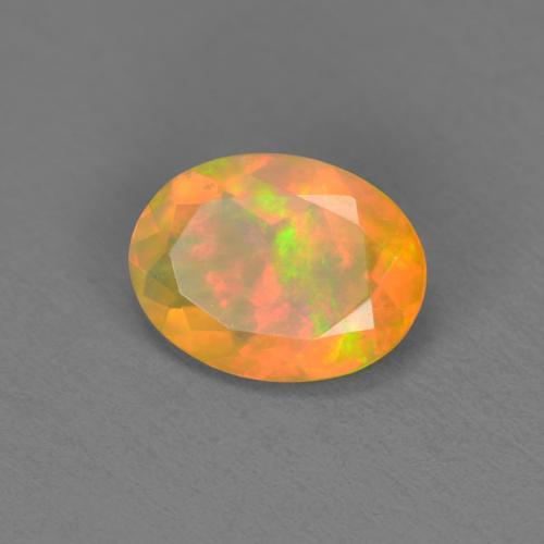 0.74캐럿 천연 멀티컬러 오팔, 타원형 컷, 8×6 mm, 투명한