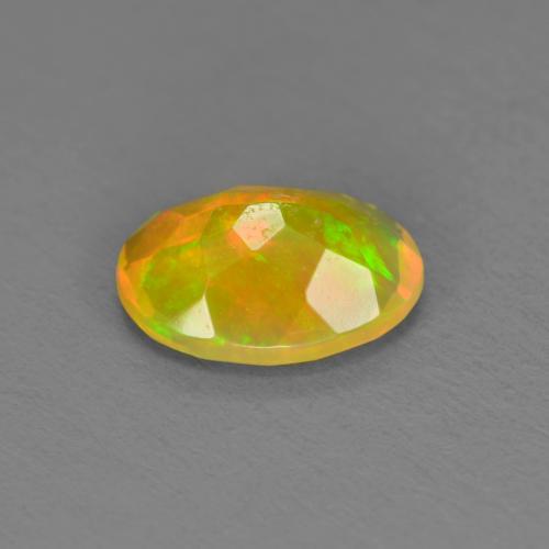 0.74캐럿 천연 멀티컬러 오팔, 타원형 컷, 8×6 mm, 투명한