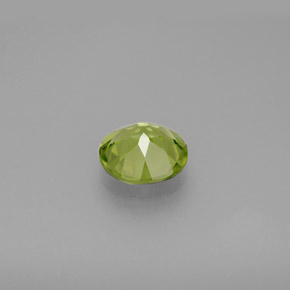 1.21캐럿 천연 생기 있는 그린 페리도트, 라운드 컷, 6.98 mm, VS