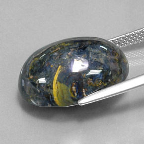 12.78캐럿 천연 멀티컬러 피터사이트, 타원형 컷, 17.9×13.1 mm, 불투명체