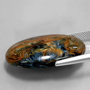31.58캐럿 천연 멀티컬러 피터사이트, 타원형 컷, 30.4×22.3 mm, 불투명체