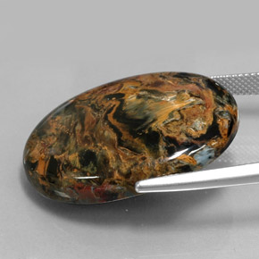 32.92캐럿 천연 멀티컬러 피터사이트, 타원형 컷, 30.1×22.1 mm, 불투명체