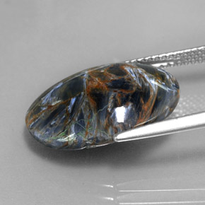 7.50캐럿 천연 멀티컬러 피터사이트, 타원형 컷, 18.3×13.5 mm, 불투명체
