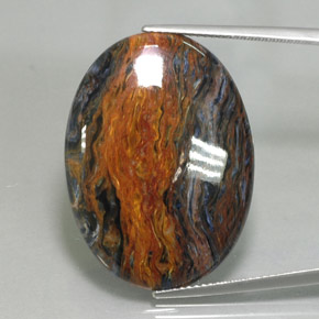 21.00캐럿 천연 멀티컬러 피터사이트, 타원형 컷, 30.1×22.2 mm, 불투명체