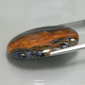 21.00캐럿 천연 멀티컬러 피터사이트, 타원형 컷, 30.1×22.2 mm, 불투명체