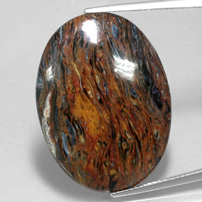 22.70캐럿 천연 멀티컬러 피터사이트, 타원형 컷, 30.1×22.3 mm, 불투명체