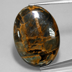 30.34캐럿 천연 회청색 피터사이트, 타원형 컷, 30.1×22.1 mm, 불투명체